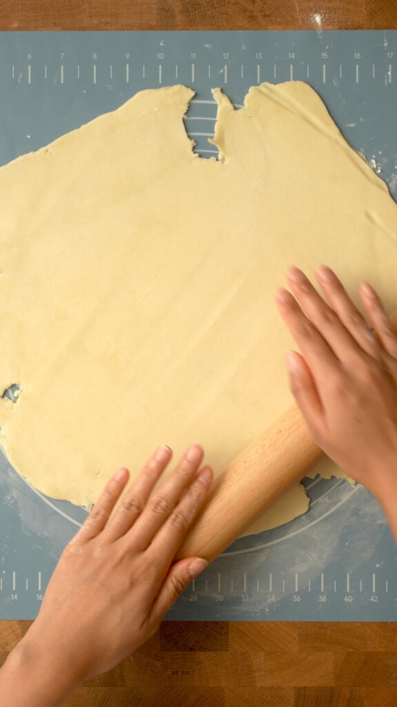 Rolling out the dough very thinly