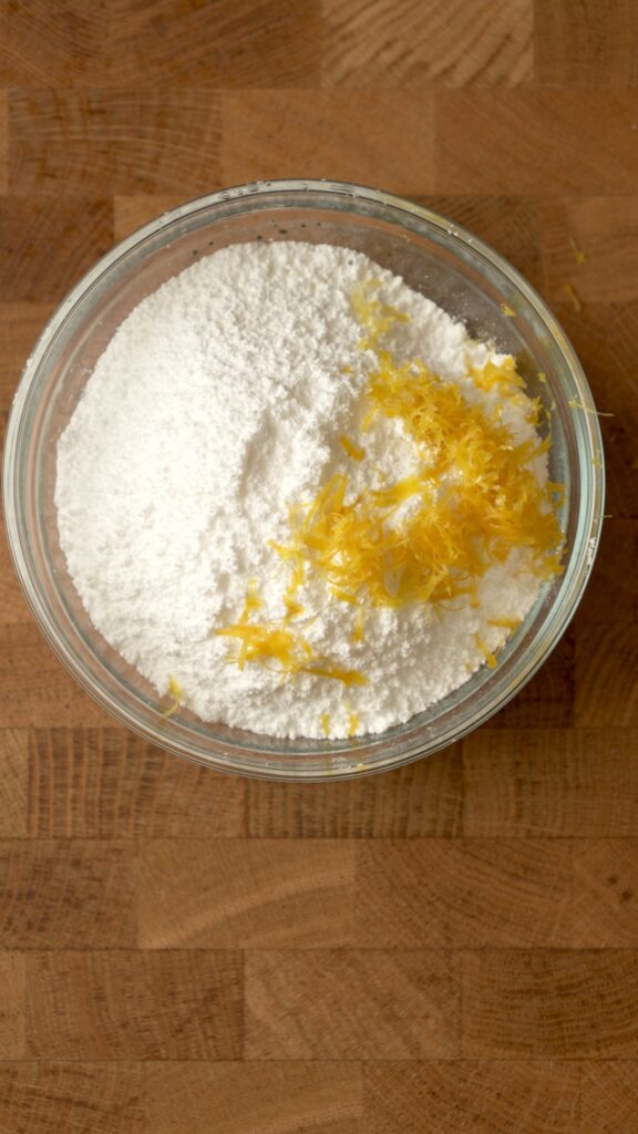 beginning the icing. powdered sugar and lemon zest