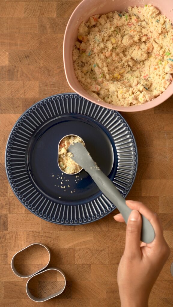 filling one mold with the dough mixture