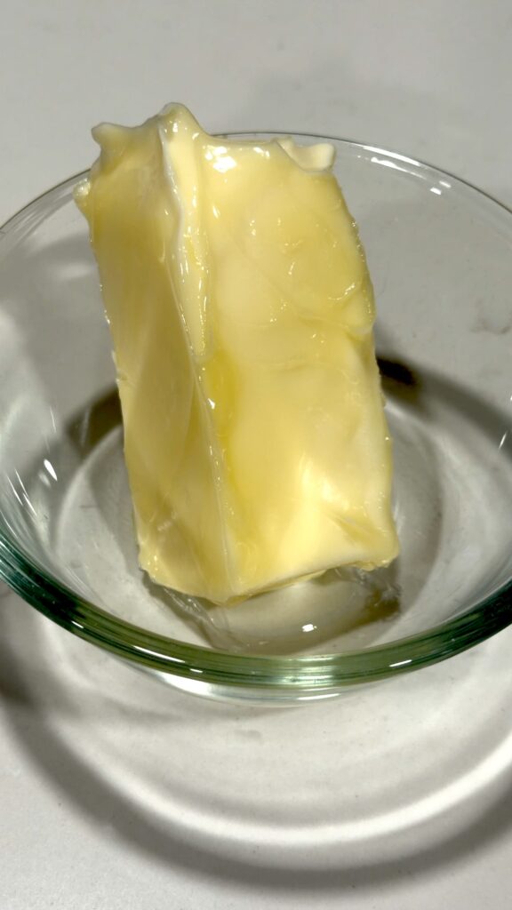 a stick of butter in a bowl