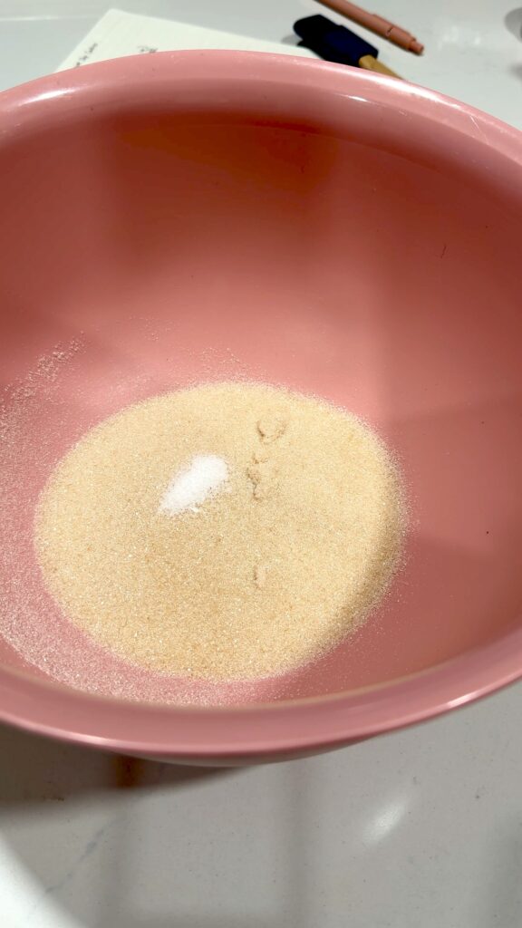 granulated sugar and salt in a mixing bowl