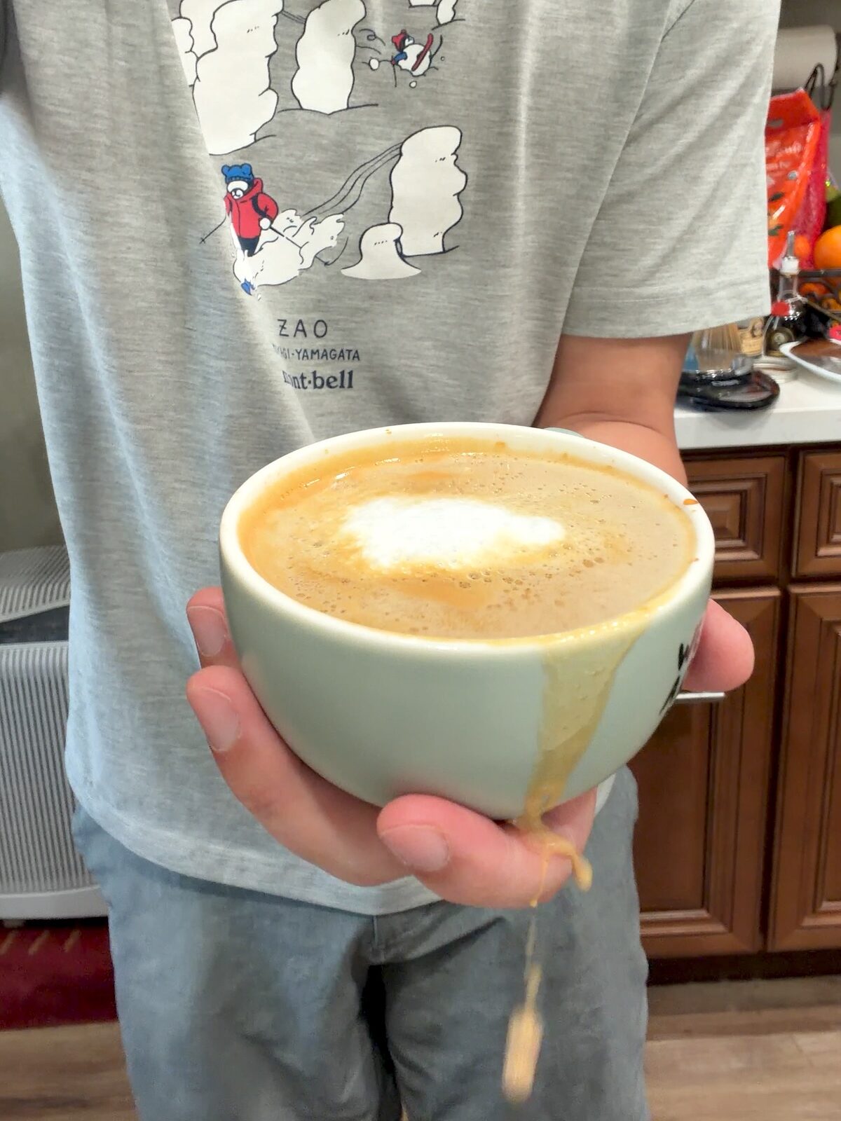 a cup filled with a banana bread latte